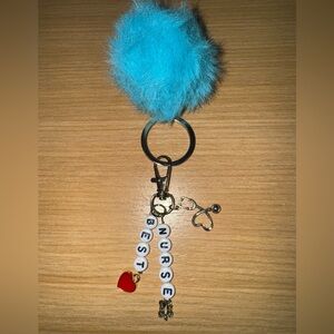 Best nurse key chain with small ball. NWT
